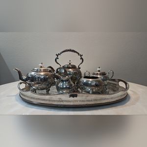 John Turton hand chased silver tea service made in England